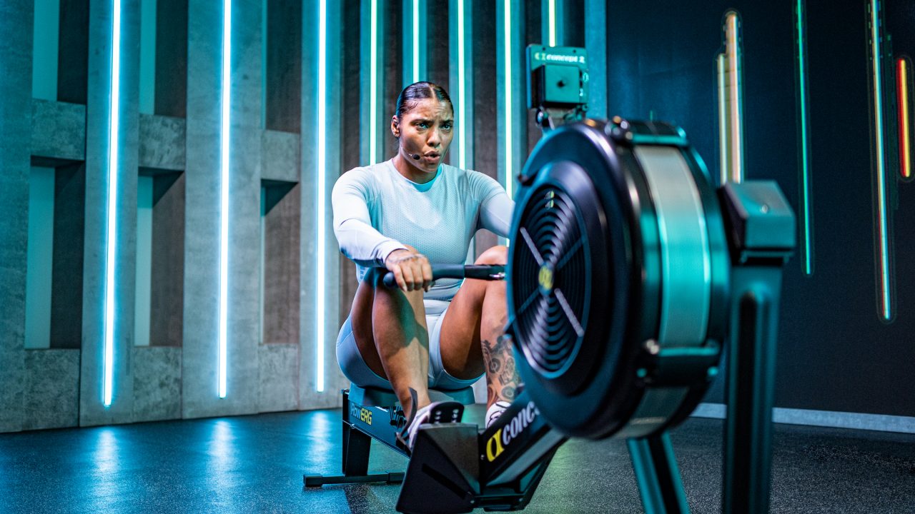 Fiit coach Chloe Whylie demonstrating a rowing class